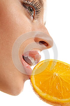 Female face with orange slice