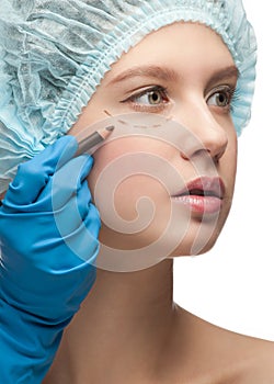 Female face before plastic surgery operation