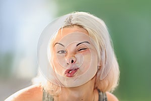 Female face pressed against glass or window photo