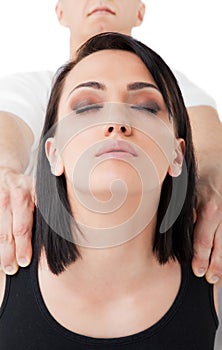 Female face shoulders massaged