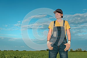 Female farmer posing in sugar beet field