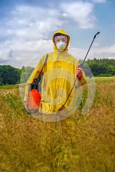 Female farmer with pressure sprayer