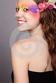 Female with fashion feather eyelashes make-up