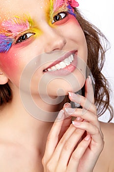 Female with fashion feather eyelashes make-up