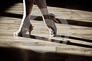 Female feet on the dance floor