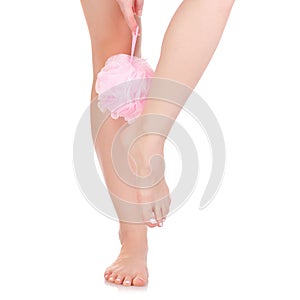 Female feet legs pink bath sponge puff beauty spa