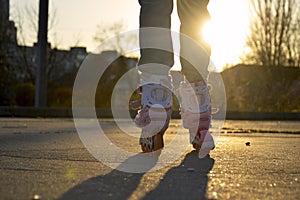 Female feet shod in rollers