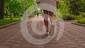 Female feet in shoes b roll pedestrian on footpath