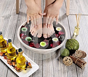 Female feet at spa salon on pedicure procedure