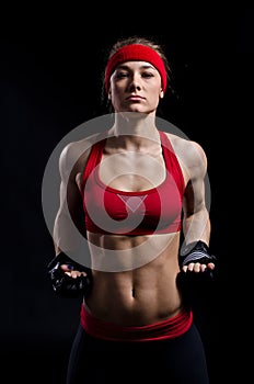 Female fighter in black gloves