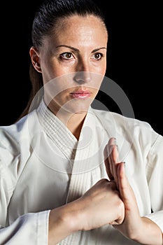 Female fighter performing hand salute
