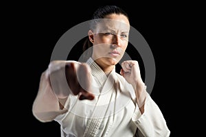 Female fighter performing karate stance