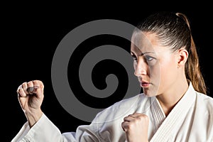 Female fighter performing karate stance