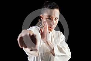 Female fighter performing karate stance