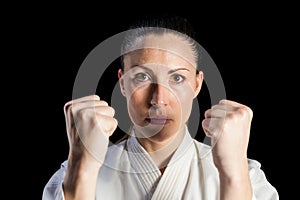 Female fighter performing karate stance