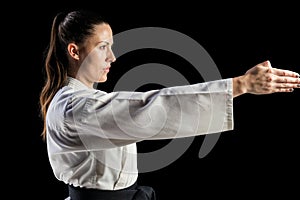 Female fighter performing karate stance