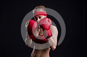 Female fighter in red gloves