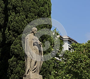 Female figure on the pedestal