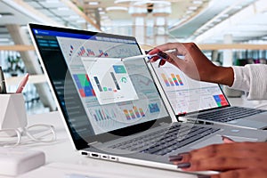 Female Financial Analyst Analyzing KPI Data