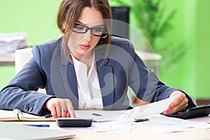 The female financial manager working in the office