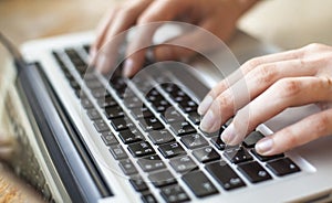 Female fingers on the keyboard close-up. Business.