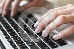 Female fingers on the keyboard close-up. Ð¡omputer training.