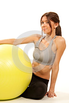 Female fitness instructor with pilates ball