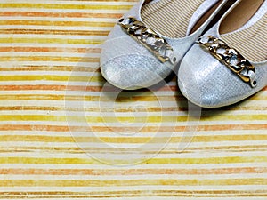 Female flat ballet shoes on colorful background