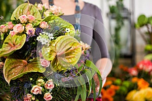 Female florist in flower shop photo