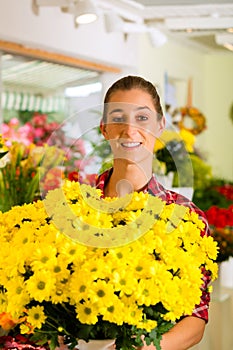 Female florist in flower shop