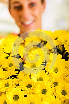 Female florist in flower shop