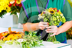 Female florist in flower shop