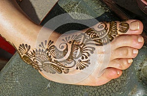 Female foot with henna tattoo