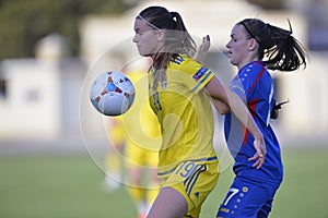 Female football game action