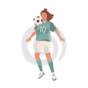 Female football player hitting ball with chest. Young woman playing soccer in green sports uniform, boots and stockings