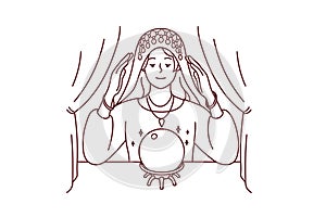 Female fortune teller with magic ball