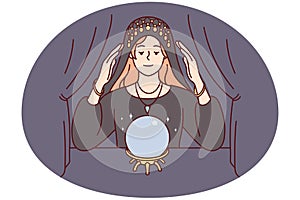 Female fortune teller with magic ball