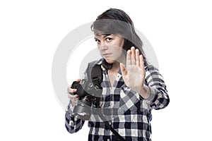 Female Freelance Photographer Holding Hands in Stop Gesture