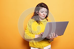 Female freelancer working on her laptop
