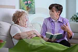 Female friends spending time together in nursing home