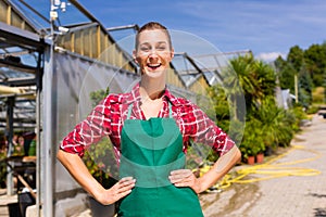 Female gardener in market garden or nursery