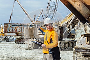 Female geologist or mining engineer at work