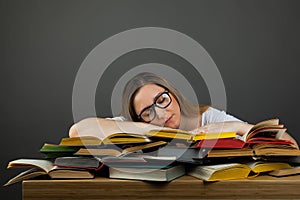 Female in glasses Studying Hard Exam and Sleeping on Books