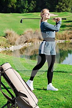 Female golfer at golf course