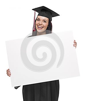 Female Graduate in Cap and Gown Holding Blank Sign