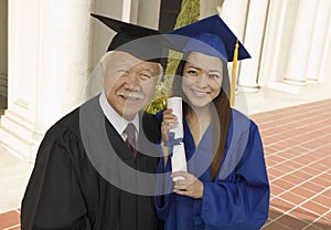 Female Graduate With Dean Smiling photo