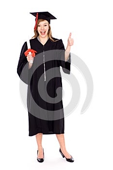 Female graduate with thumb up