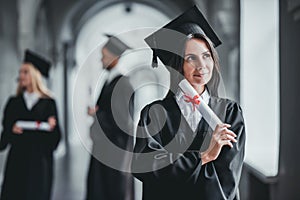 Female graduate in university photo