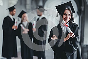 Female graduate in university photo
