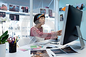 Female Graphic designer using graphic tablet
